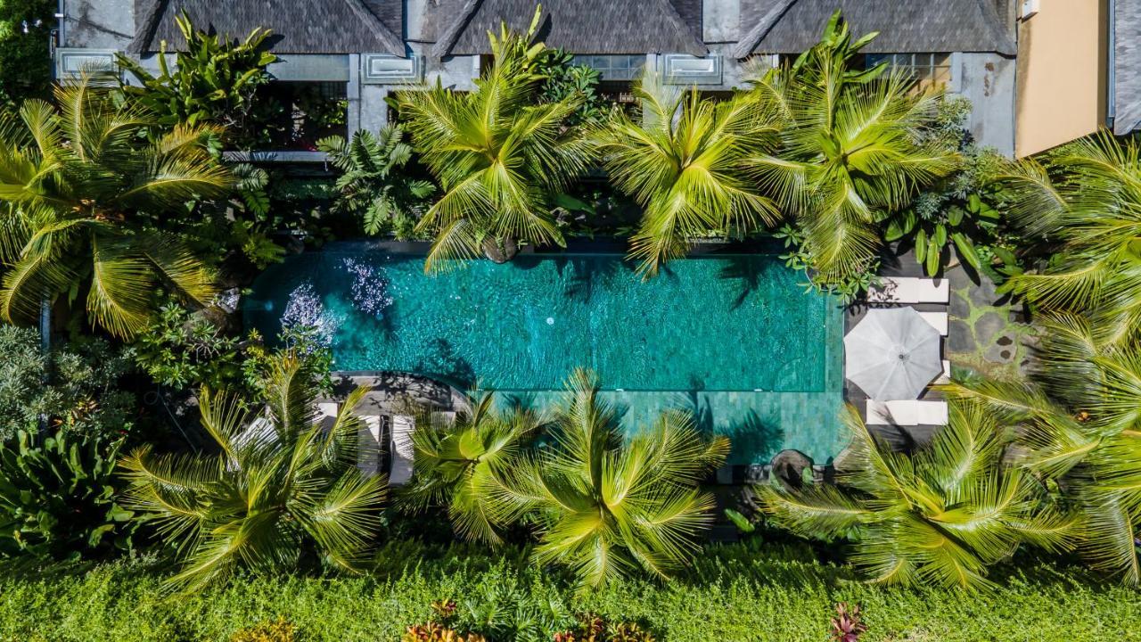 Weda Cita Resort And Spa By Mahaputra Ubud Exterior foto The swimming pool at the hotel